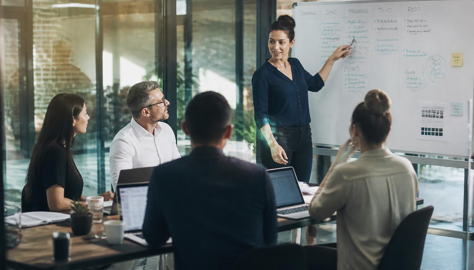 A small team meeting chaired around an agenda